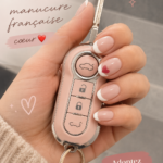 Nail art inspiré par Pink avec des couleurs vives et motifs flamboyants.