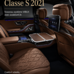 Une vue élégante de la nouvelle Mercedes-Benz S-Class 2021 sur une route ensoleillée.