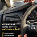Femme souriante au volant de sa voiture, prête à prendre la route en toute confiance.