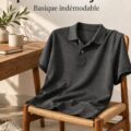 Femme professionnelle portant un polo gris foncé élégant et moderne, prête pour une journée de travail.